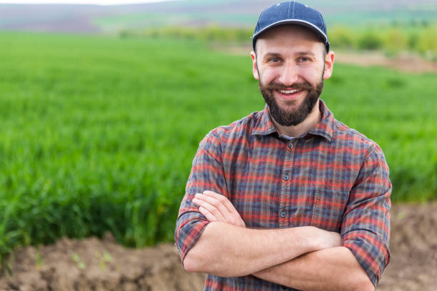 istock Farmer standing with arms crossed 1144322376