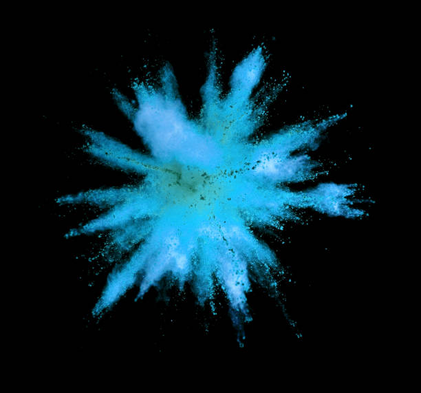 istock Explosion of blue powder on black background 1144322715