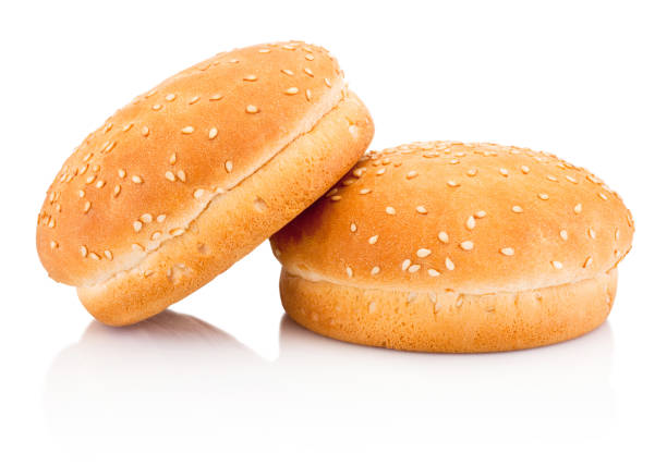 istock Two hamburger buns with sesame isolated on white background 1144322790