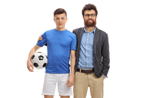 istock Teenage soccer player with his father posing 1144325155