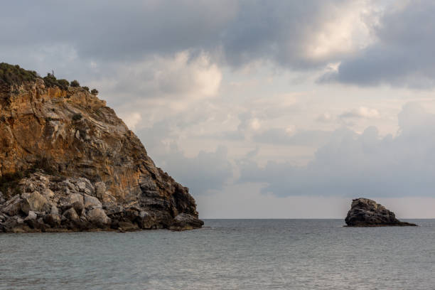 istock Seascape with picturesque rocks and cloudy sky 1144326324