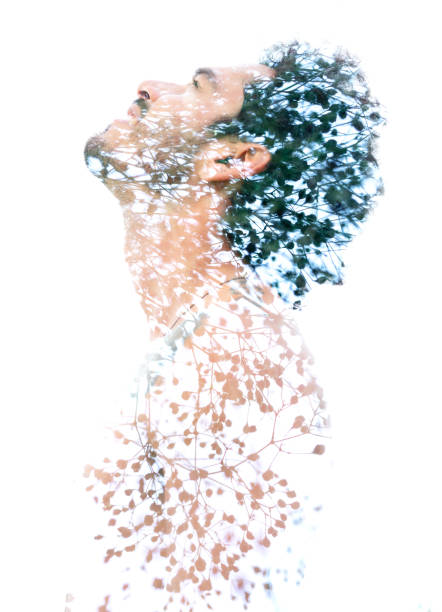 istock Double exposure of a young bare-chested man's portrait blended with tree branches and leaves, showing the perfect beauty of nature's creation 1144328182