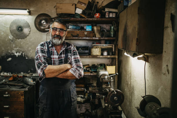 istock Senior metal worker portrait 1144333356