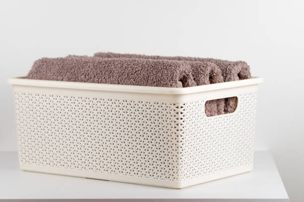 istock Terry towels folded in a plastic basket. 1144333619