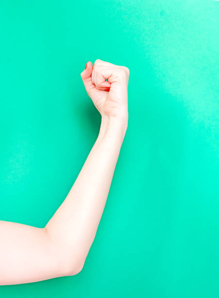 The Flexing or Strong Arm Hand Sign. Use the flexed biceps sign to indicate strength.