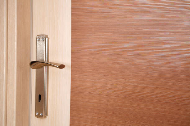 istock Modern wooden door close-up 1144338800
