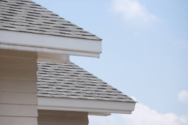 istock grey roof shingle with blue sky background. Asphalt Shingle. 1144340723