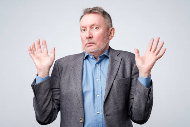 istock Handsome mature worker giving up. Who care concept 1144343196
