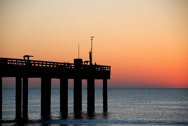 istock sunrise at fishing pier 114434472