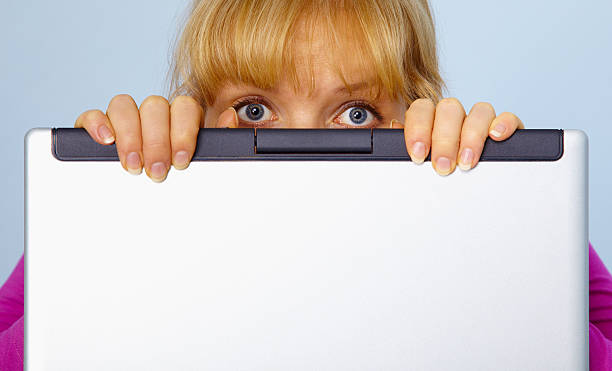 Screen Behind Computer 210+ Hiding Behind Screen Stock Photos, Pictures & Royalty-Free Images ...