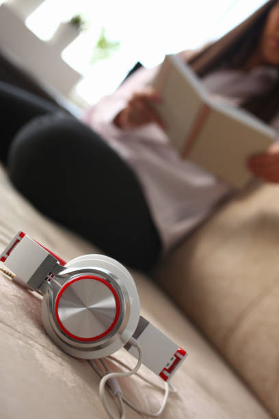 istock White headphones on sofa closeup 1144346198
