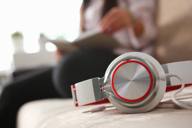 istock White headphones on sofa closeup 1144346199