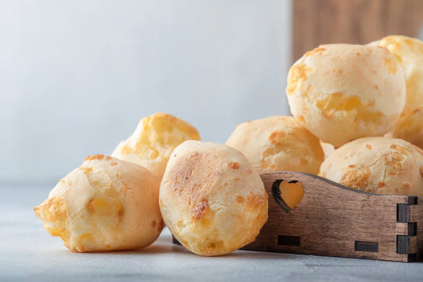 istock Delicious custard cheese buns on gray kitchen table background, selective focus. Place for text 1144349386