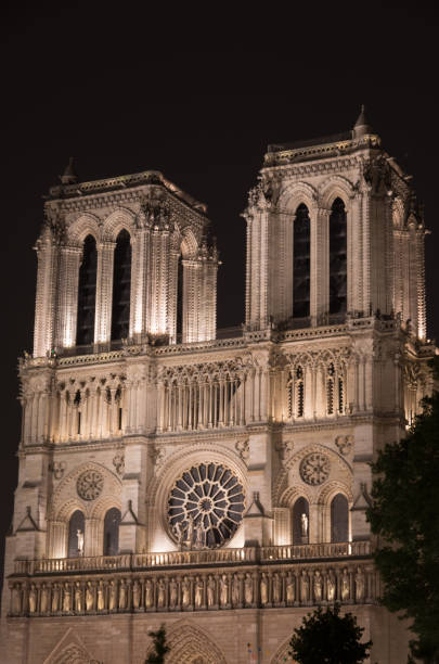istock Notre Dame lit up at night 1144349539