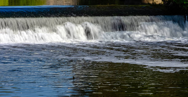 istock River Avon cascade in Warwick, Warwickshire, United Kingdom 1144350374
