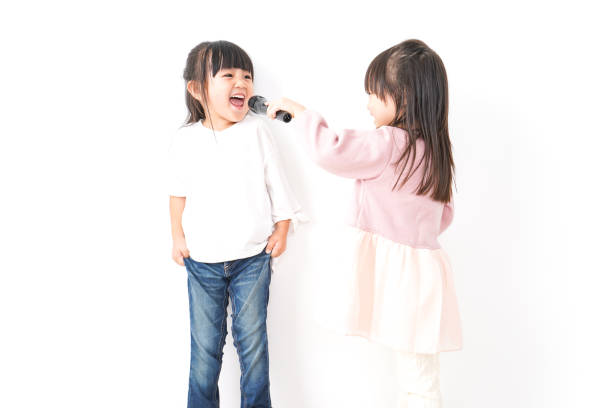 istock Girls sing a song 1144350899