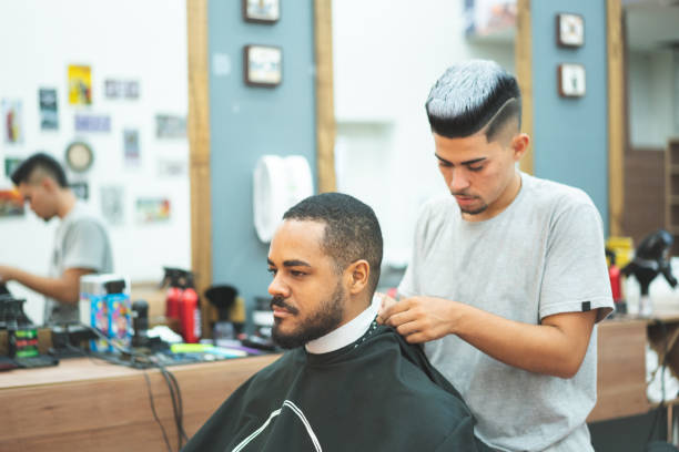 istock Preparing the client to cut hair 1144351757