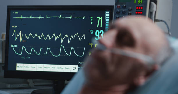istock Sleeping patient and heart monitor 1144352773
