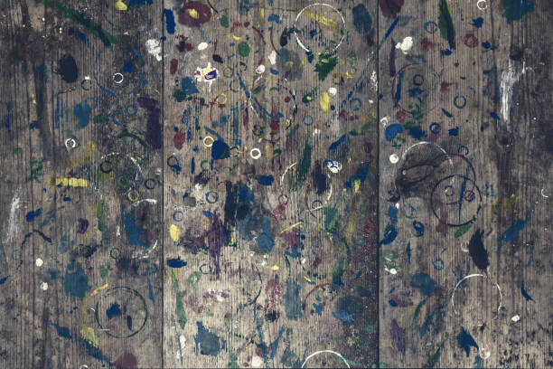 istock Top view old paint stained artist empty table. Artistic background 1144356277