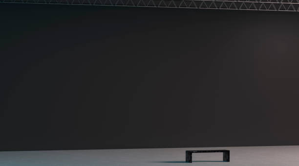 istock Blank black huge gallery wall with bench in museum mockup 1144356397