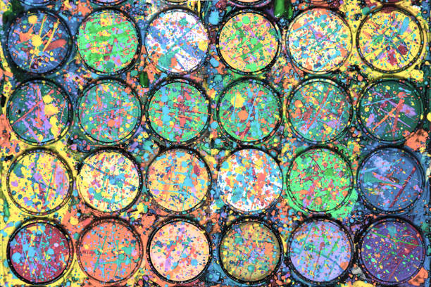 istock Watercolor paint palette. Colourful paint splash. Artistic background 1144356478