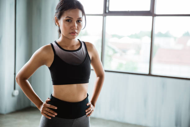 istock woman with her hands on hips exercising 1144359062