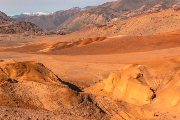 istock Yellow and red rocks under blue sky. Desert landscape with mountains. 1144360898