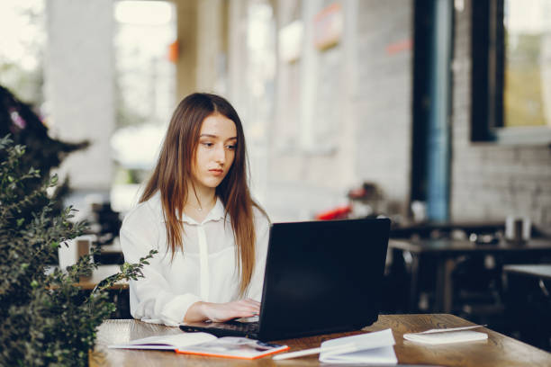 istock girl with laptop 1144360948