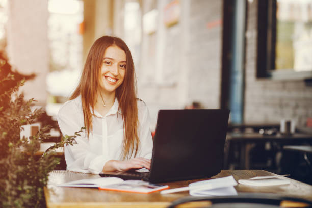 istock girl with laptop 1144361011