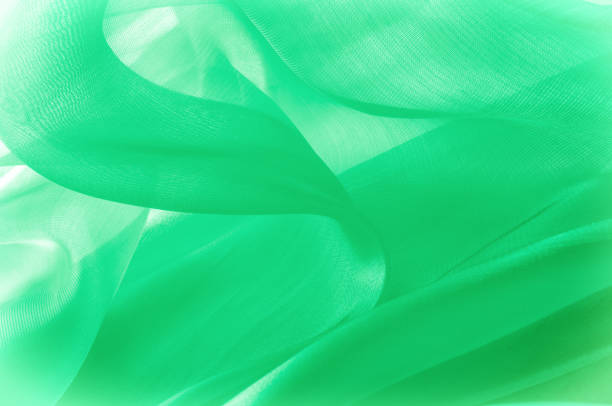 istock Texture, background, pattern. Green silk fabric for draping. Abstract Fabric, Artistic Waving Cloth Fractal Pattern 1144364313