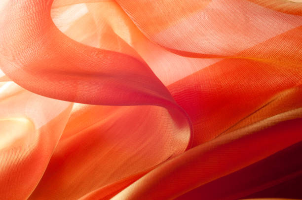 istock Texture, background, pattern. Orange Silk Fabric for Drapery Abstract Background. Abstract Fabric Flame Background, Artistic Waving Cloth Fractal Pattern 1144364370