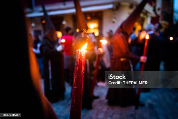 Penitent Procession In The Street During Holy Week In Seville Stock Photo - Download Image Now