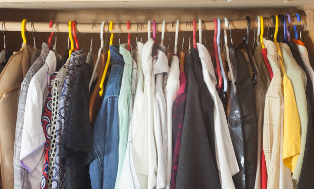 istock many clothes in closet. 1144364769