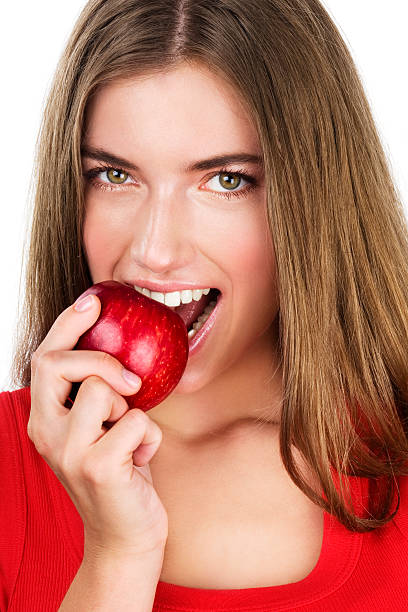 istock Young woman with red apple 114436480