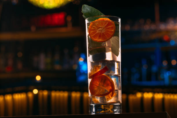 istock Transparent cocktail with ice and tangerine 1144364949
