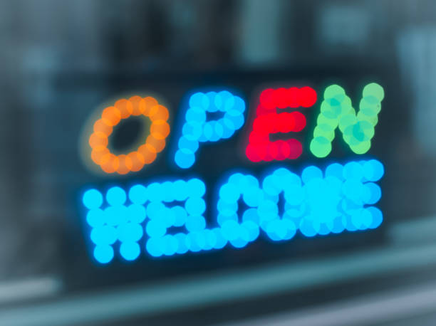istock Open Welcome. De focused color LED bokeh twinkling lights 1144366105