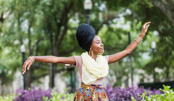 Graceful young African-American woman dancing