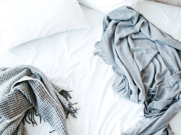istock morning awakening new day messy unmade bed 1144368470