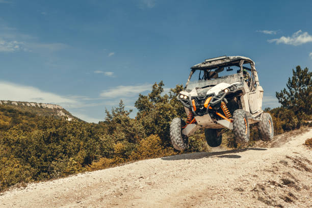 istock ATV jump in the mountains 1144368560