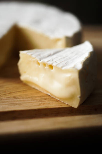 istock Camembert cheese on a cutting board. 1144368811