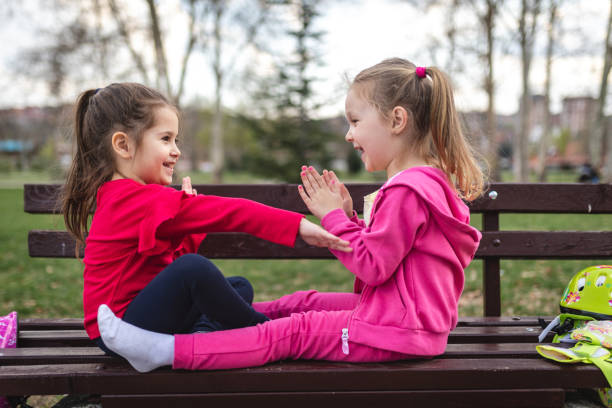 istock Playful children having fun at a park in Spring 1144370121