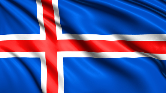 Iceland flag blowing in the wind. Against an overcast sky