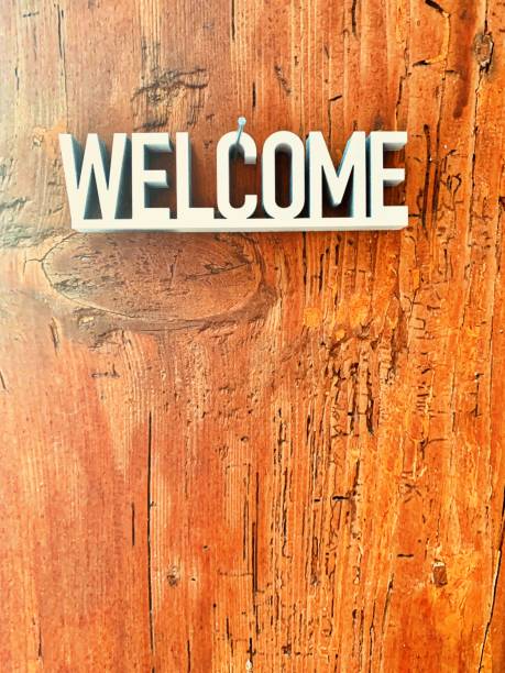 istock Welcome sign on wooden brown background 1144370914
