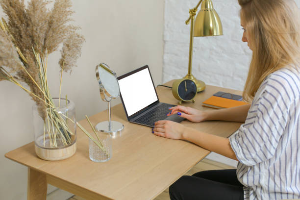 istock woman working at the lap 1144371771