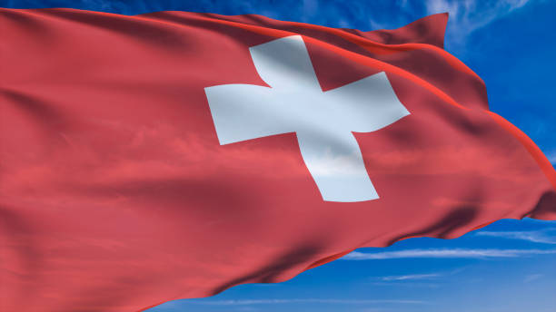 istock flag of Switzerland with fabric structure against a cloudy sky 1144371904