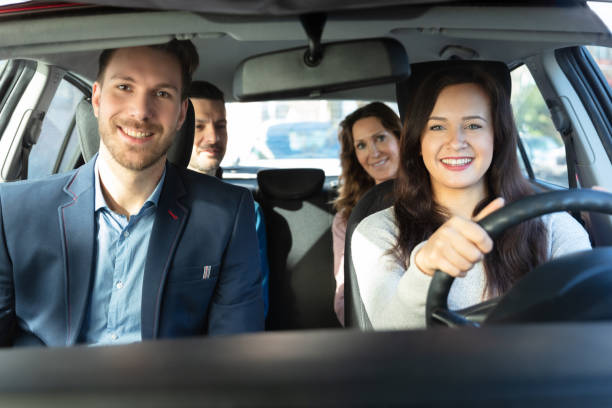 istock Smiling People Sitting In Car 1144373543