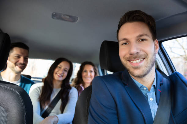 istock Smiling People Sitting In Car 1144373563