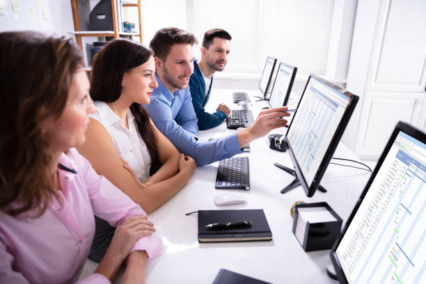istock Stock Market Broker Analyzing Gantt Chart On Computer 1144373632