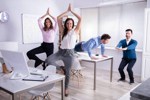 istock Businesspeople Doing Yoga 1144374114