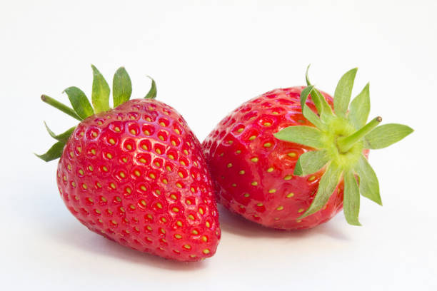 istock Strawberries isolated on white background. 1144374307